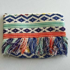 Canvas pouch with fringe handbag
